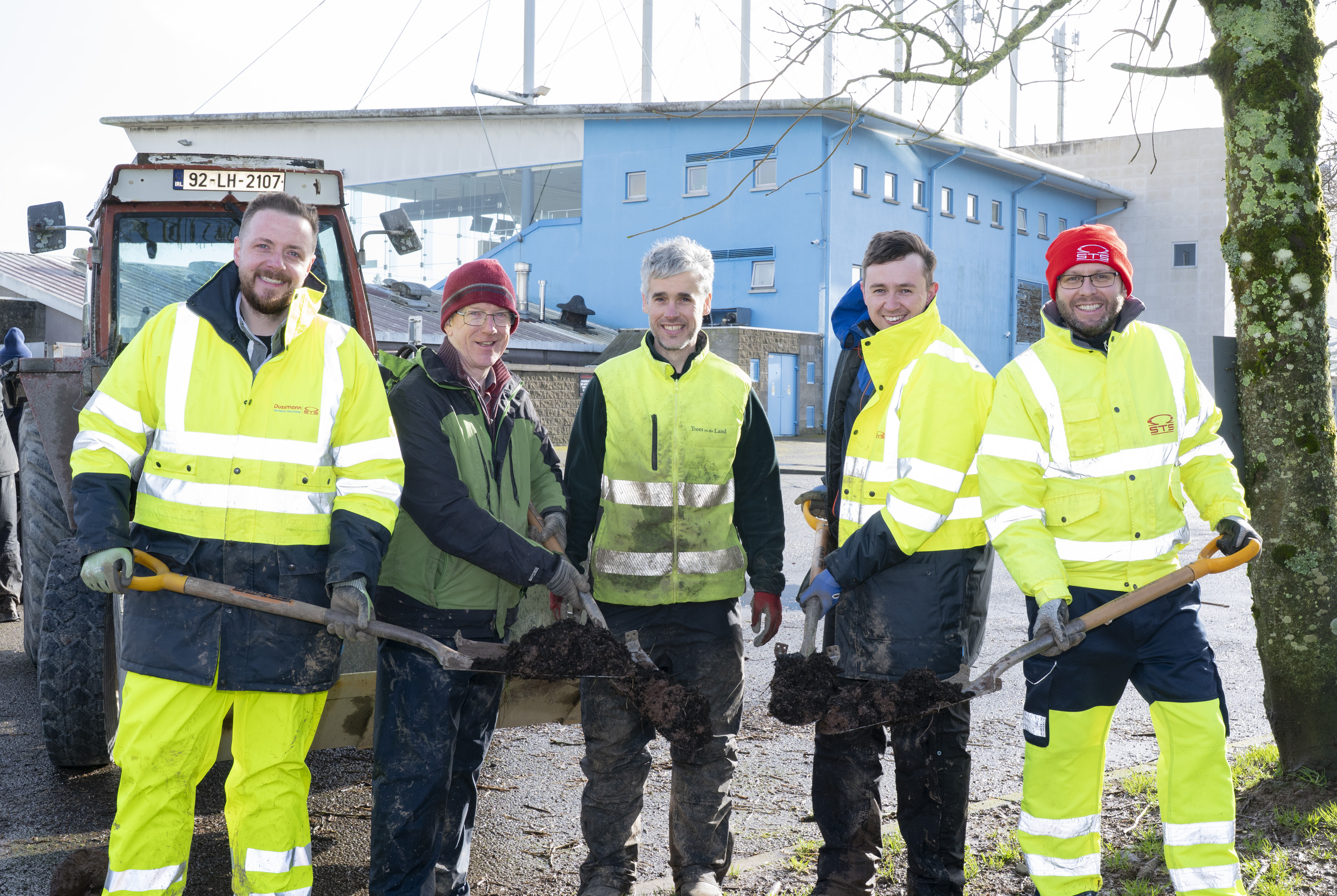 Members of STS Group Cork assist with the planting of native Irish trees at Curraheen Park, using equipment and tools to prepare the ground as part of the stadium’s sustainability initiative.