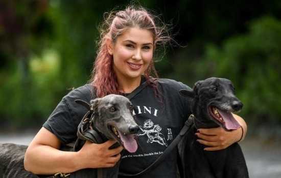 Greyhound Trainer Margaret Bolton at home with two of her beloved greyhounds Greyhound Trainer Margaret Bolton at home with two of her beloved greyhounds