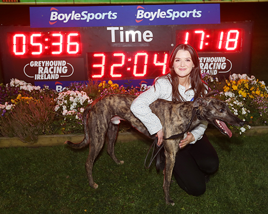 Emma Buckley with Ower Cracker after he broke the 600 yards track record Emma Buckley with Ower Cracker after he broke the 600 yards track record